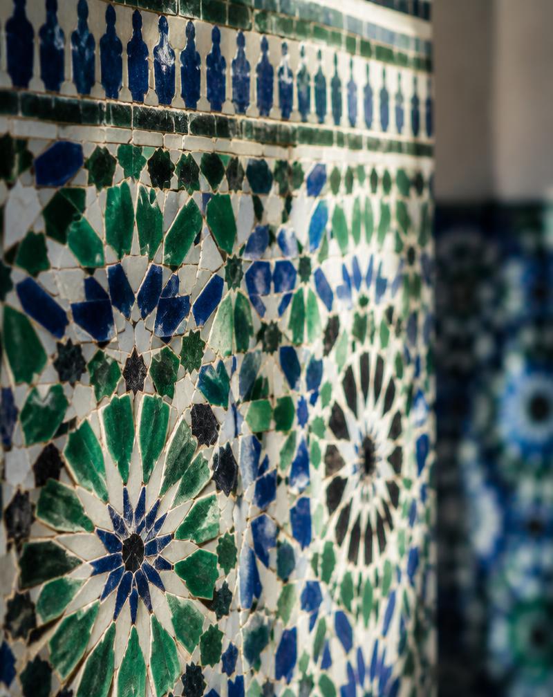 Intricate green and blue zellige tilework